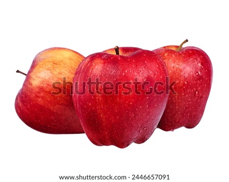 Three red apples isolate on white. Apples are a thin focal part in the center of the fruit