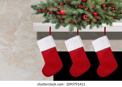 Three Red Christmas Stockings On Fireplace Mantle