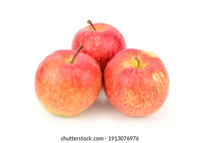 Three red ripe apples isolated on white background