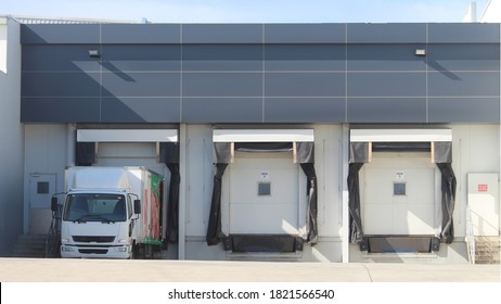 Three Refrigerated Truck Loading Docks Of A Modern Food Manufacturing Facility. Western Sydney Australia