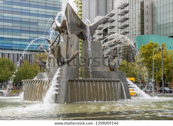 The Three Rivers Fountain in\
Victoria Square, Adelaide, Southern Australia,\
Oceania\
