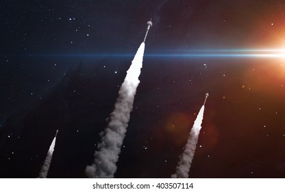 Three Rockets In Space. Elements Of This Image Furnished By NASA