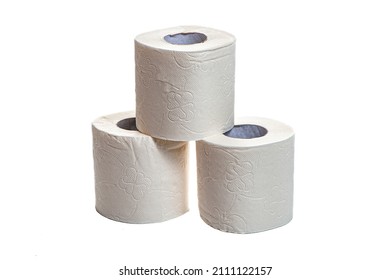 Three Rolls Of Toilet Paper Stand In A Pyramid On A White Isolated Background