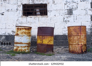 Three Rusty Barrels