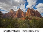 Three sandstone peaks in the west of Zion Canyon known as the Three Patriarchs 