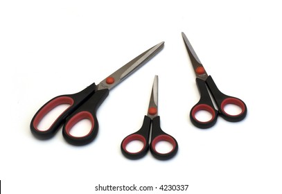 Three scissors on white background