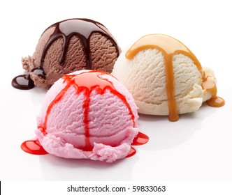three scoops of ice cream with syrup