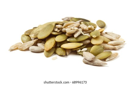 Three seed mixture of  Pumpkin, sunflower and sesame seeds isolated on white.