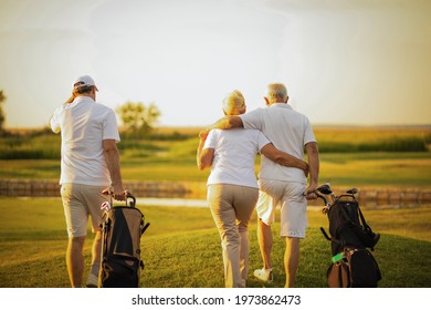 Three senior golfers walking and talking. Enough for today.  - Powered by Shutterstock