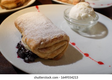 Three Servings Of Strudel With Ice Cream. Tasty And Not Bad Food.