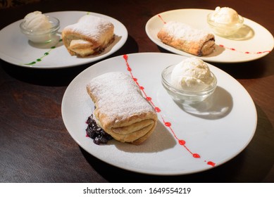 Three Servings Of Strudel With Ice Cream. Tasty And Not Bad Food.