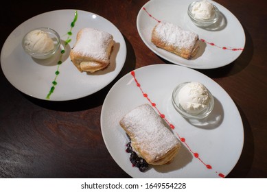 Three Servings Of Strudel With Ice Cream. Tasty And Not Bad Food.