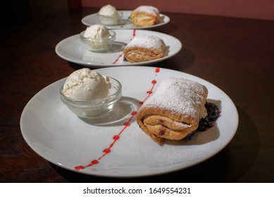 Three Servings Of Strudel With Ice Cream. Tasty And Not Bad Food.