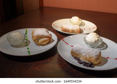 Three Servings Of Strudel With Ice Cream. Tasty And Not Bad Food.