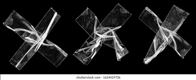 three sets transparent sticky tapes forming the letter x overlapping each other black background  crumpled plastic snips  poster design overlays elements 