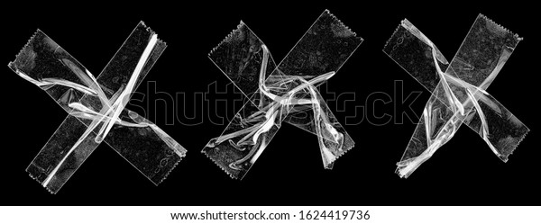 three sets of\
transparent sticky tapes forming the letter x or overlapping each\
other on black background, crumpled plastic snips, poster design\
overlays or elements.