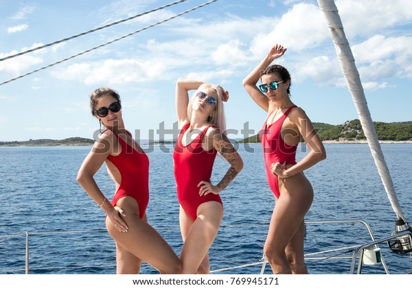 Three Sexy Young Women Red Bikinis Stock Photo Edit Now 769945171