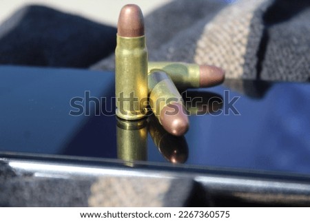 three shells with blac background