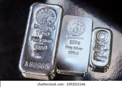 Three Silver Bars Of Different Weight. The Surface Of Cast Silver Bullion.  