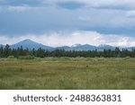 The Three Sisters Cascade Volcanos from La Pine, Oregon on Cloudy Day