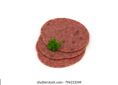 Three Slices Of Corned Beef On A White Background