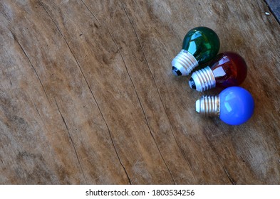 Three small colored light bulbs
