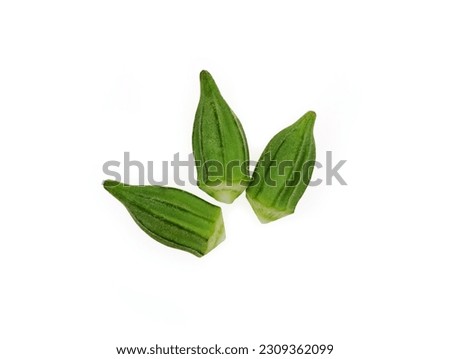 three small okra, fresh okra zero size ready for cooking isolated on white background