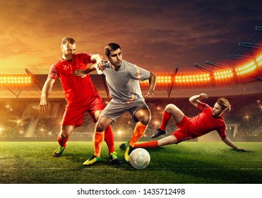 Three Soccer Players Fight For A Ball. Tough Competition.  Slide Tackle. Soccer Stadium (3D Render)