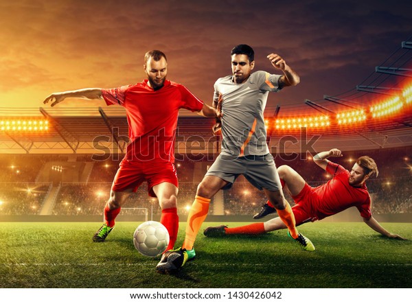 Three Soccer Players Fight Ball Tough Stock Photo (Edit Now) 1430426042