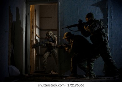 Three Soldiers In Full Uniform Stormed The Building At Night. Hostage Rescue Operation.