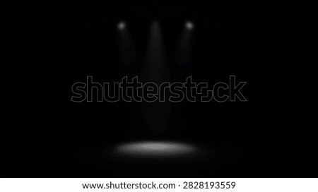 Three spotlights shine down on a dark stage, creating a bright circle of light on the floor, suggesting a performance or event.