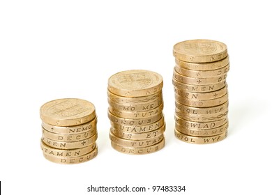 Three stacks of coins on an isolated background