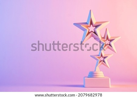Three star trophy award statuette model with shadow, against gradient purple and pink background with copy space