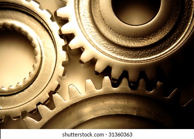 Three Steel Gears Joining Together