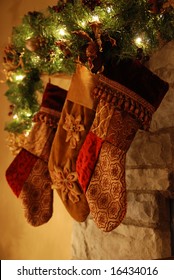 Three Stockings Hanging On The Fireplace