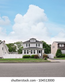 Three Story Suburban Home Front Yard Walkway American Flag Curb Residential Neighborhood Street