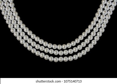 Three Strand Pearl Necklace On Black Background