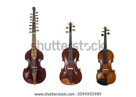 Three stringed musical instruments of the viol family in comparison, viola d amore, viola and violin, isolated on a white background, copy space