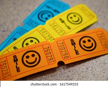 Three Strips Of Tickets At The School Carnival 