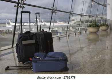 Three Suitcases At Seatac Airport In Seattle