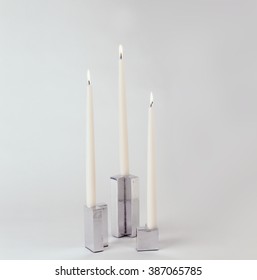 Three Tall White Candles