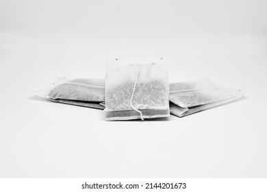 Three tea bags isolated on white background