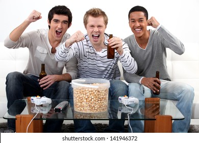 Three Teenagers Having A Party At Home