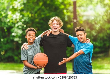 The Three Teens Friends In Sportswear Playing Basketball Game