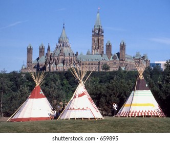 Three teepees across the river from the Parliament buildings in Ottawa, Ontario. Canada.
