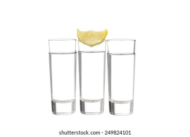 Three  Tequila Shots With Lime Isolated On White Background