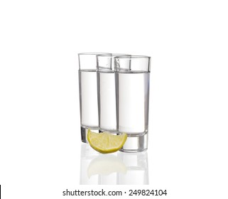 Three  Tequila Shots With Lime Isolated On White Background