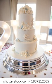 Three Tiered White Wedding Cake 