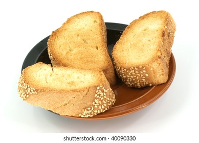 three toasted piece of bread on plate on white background