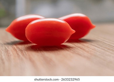 three tomatoes under sun light